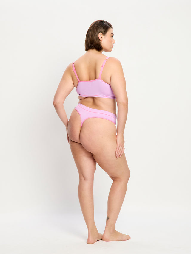 CZTHMWVIOW_MB_Modibodi_Smileyworld_Seamless_Thong_Moisture_Wicking_Violet_Update2-7_Kaitlyn_16-XL.jpg