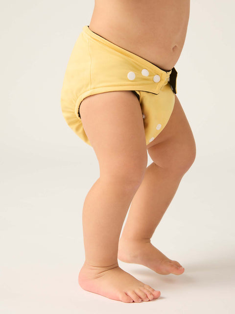 OTNAOSNAABRB-FAMILY_Baby_Reusable Nappy 4 Pack_LP_Abstract Bright_Yellow-48_model_baby_OSFM.jpg