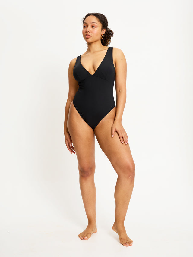 SWSCLMBLAW-2_Swimwear_V_Plunge_One_Piece_Black_302_Model_Liv-S_14-L.jpg